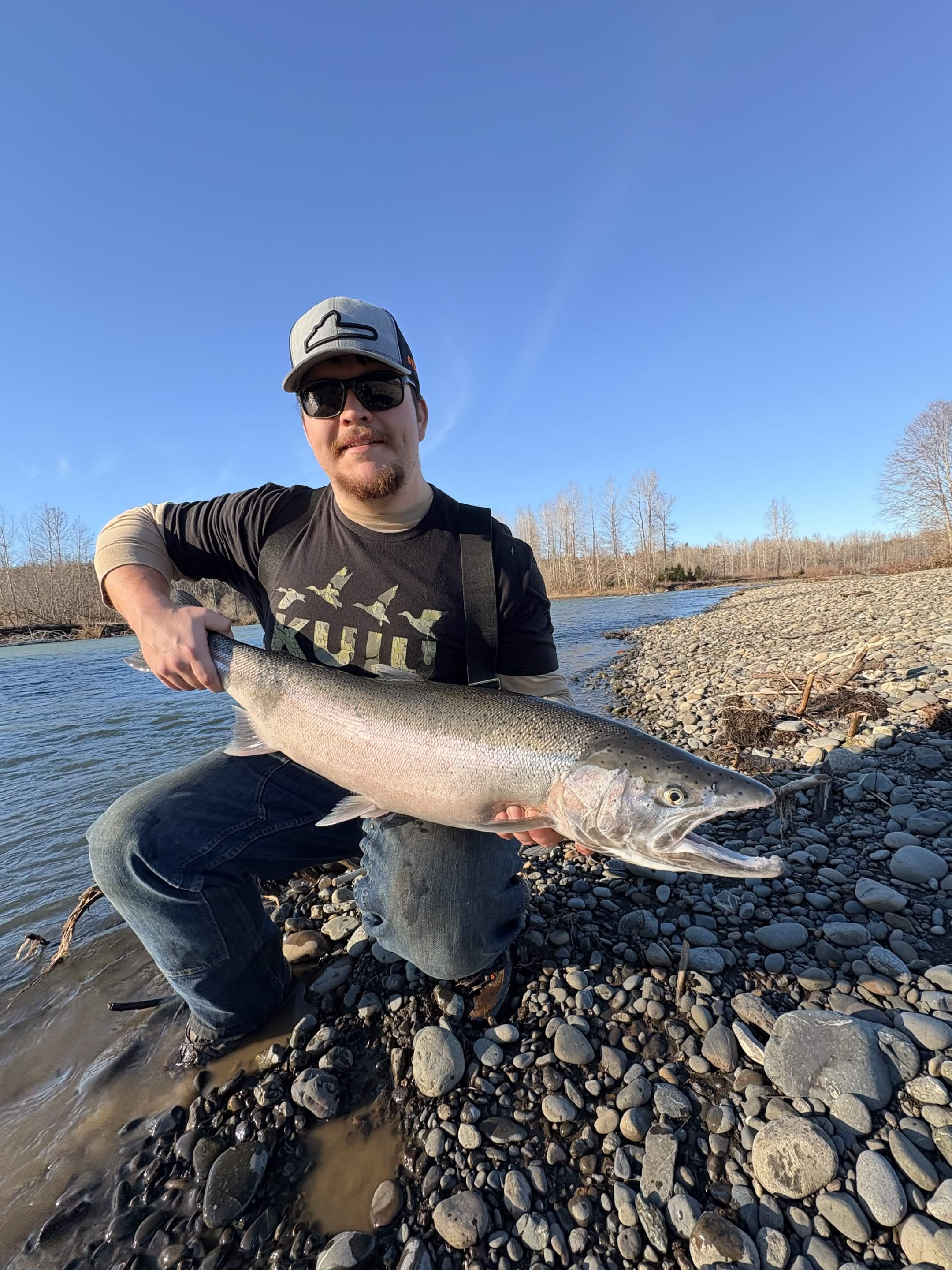 Happy client with a large steelhead